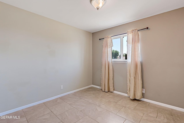 10321 Thor St, El Paso, TX 79924 - unfurnished room with baseboards and light tile patterned floors