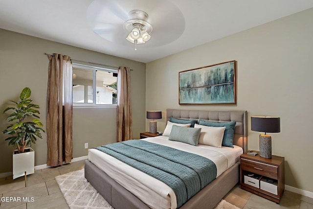 10321 Thor St, El Paso, TX 79924 - bedroom featuring light tile patterned floors, baseboards, and a ceiling fan