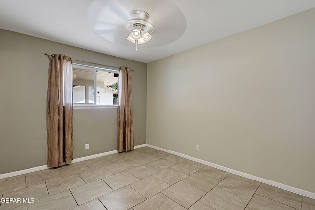 10321 Thor St, El Paso, TX 79924 - spare room with ceiling fan, baseboards, and light tile patterned floors