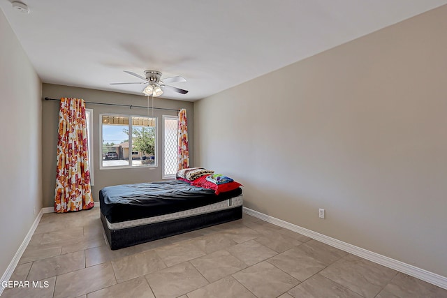10321 Thor St, El Paso, TX 79924 - bedroom featuring baseboards and ceiling fan
