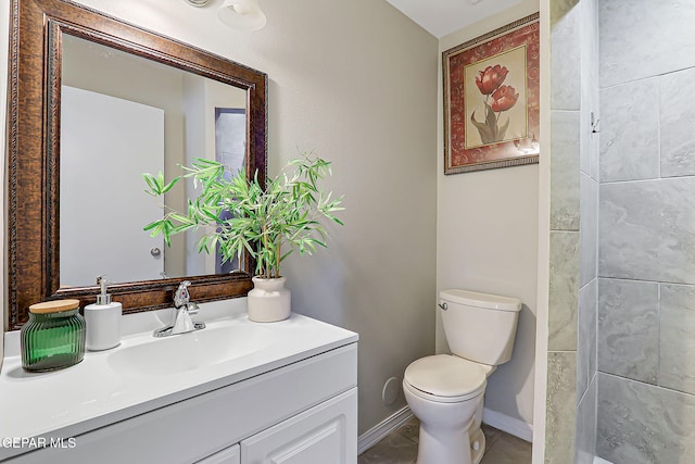 10321 Thor St, El Paso, TX 79924 - bathroom featuring vanity, toilet, baseboards, and a shower