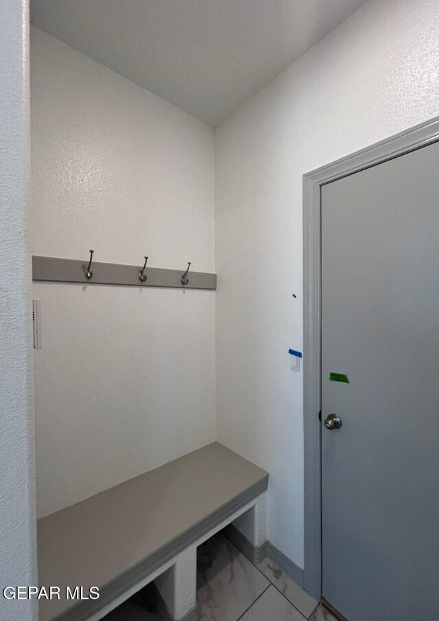 12868 Star Gaze Ave, El Paso, TX 79928 - mudroom featuring light marble finish floors
