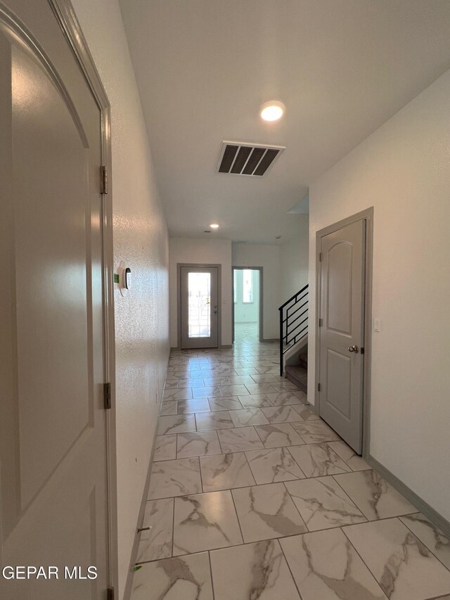 12868 Star Gaze Ave, El Paso, TX 79928 - hall featuring recessed lighting, baseboards, stairway, and light marble finish floors