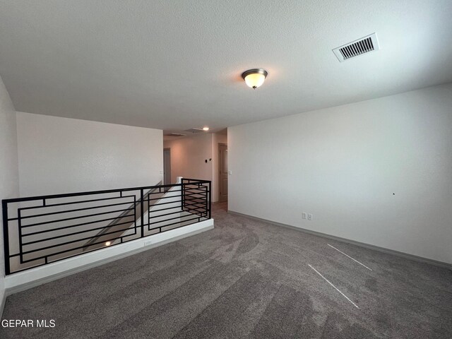 12868 Star Gaze Ave, El Paso, TX 79928 - carpeted empty room featuring baseboards