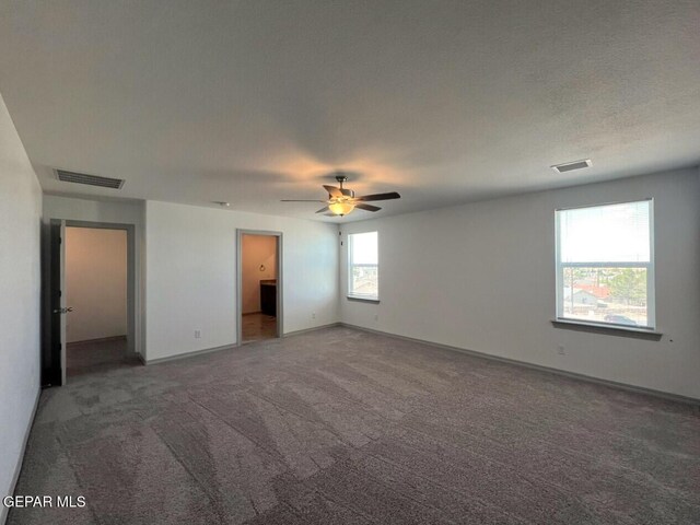 12868 Star Gaze Ave, El Paso, TX 79928 - unfurnished bedroom featuring carpet flooring, baseboards, and a ceiling fan