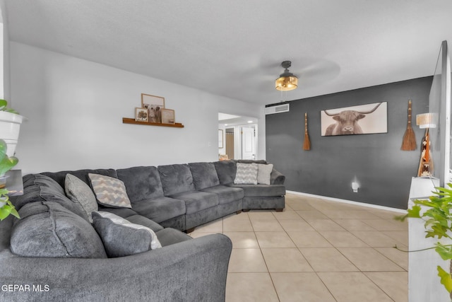 5717 Port Lavaca Dr, El Paso, TX 79924 - living area featuring ceiling fan, light tile patterned floors, and baseboards