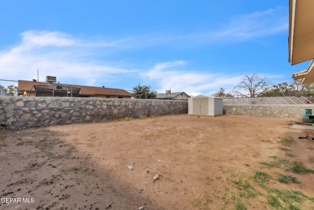 5717 Port Lavaca Dr, El Paso, TX 79924 - fenced backyard with central AC unit