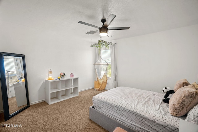 14382 Karen Point Ct, El Paso, TX 79938 - bedroom with carpet, multiple windows, and ceiling fan