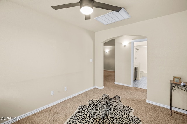 14382 Karen Point Ct, El Paso, TX 79938 - carpeted empty room with arched walkways, ceiling fan, and baseboards