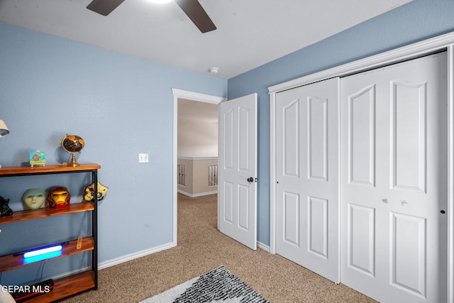 14382 Karen Point Ct, El Paso, TX 79938 - bedroom with carpet floors, baseboards, a closet, and ceiling fan