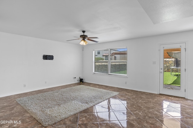 1497 Dunlin Pl, El Paso, TX 79928 - empty room with a ceiling fan and marble finish flooring