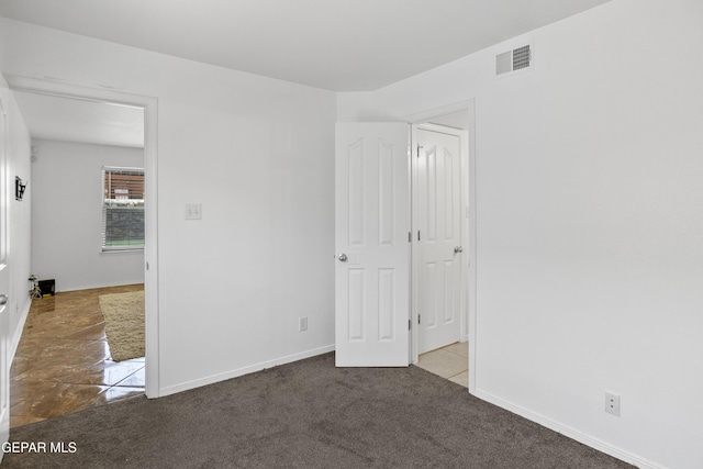1497 Dunlin Pl, El Paso, TX 79928 - unfurnished bedroom with baseboards and carpet floors