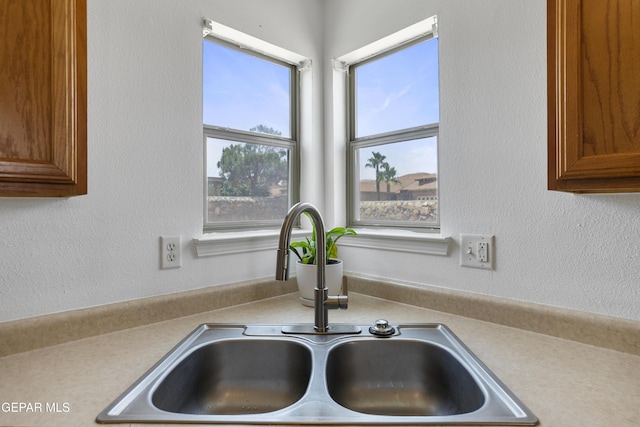 1497 Dunlin Pl, El Paso, TX 79928 - kitchen view of light countertops and brown cabinets