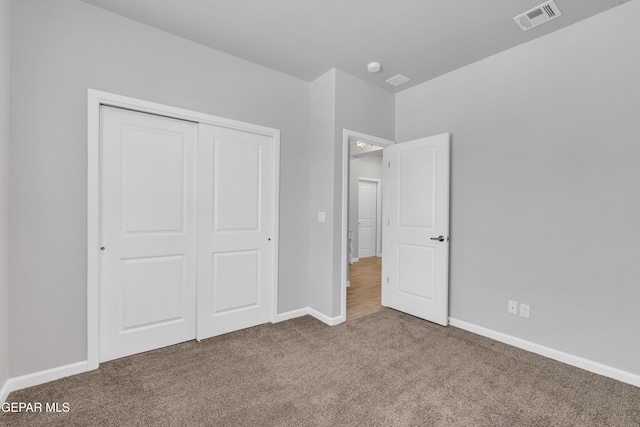 13727 Harbottle St, El Paso, TX 79928 - unfurnished bedroom with carpet flooring, a closet, and baseboards