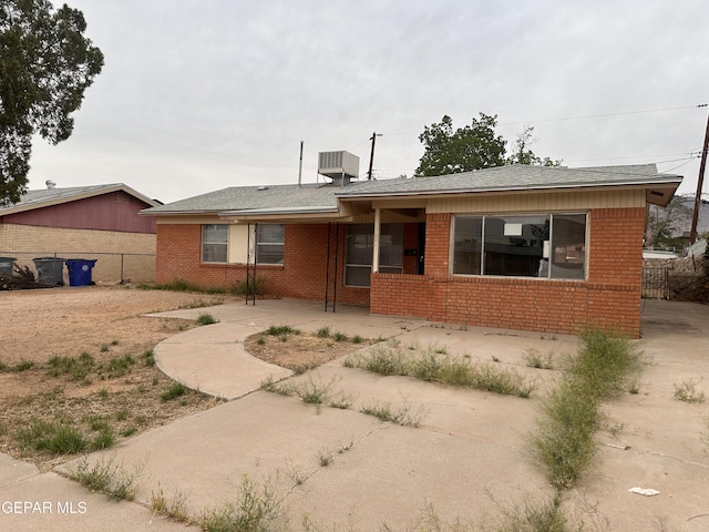 10041 Newcastle Dr, El Paso, TX 79924 - ranch-style house with brick siding and central air condition unit