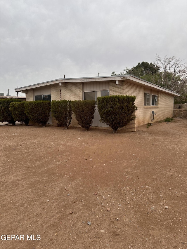 5537 Vancouver St, El Paso, TX 79924 - view of property exterior with brick siding