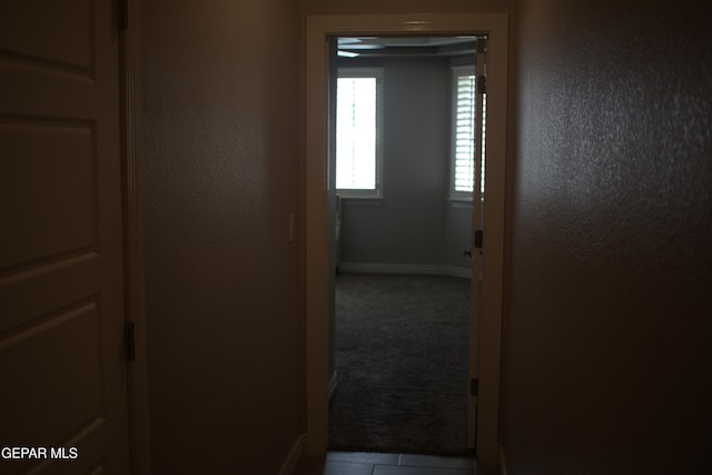3136 Red Crk, El Paso, TX 79938 - corridor featuring baseboards and carpet flooring