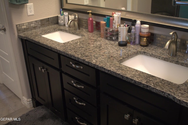 3136 Red Crk, El Paso, TX 79938 - full bathroom featuring double vanity, backsplash, and tile patterned floors