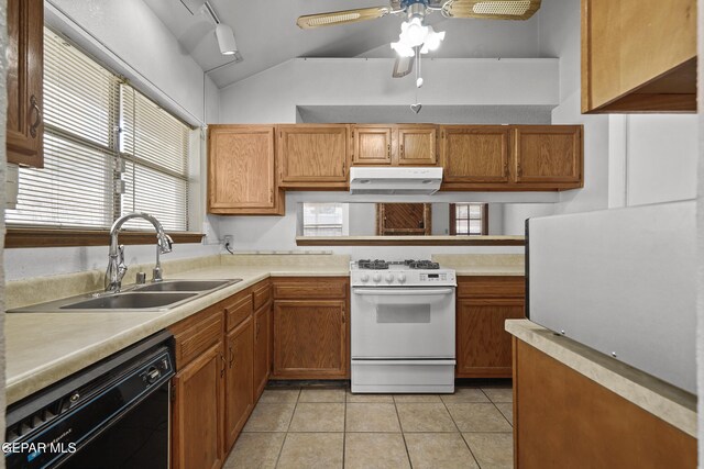 4513 Gen Maloney Cir, El Paso, TX 79924 - kitchen with gas range gas stove, under cabinet range hood, black dishwasher, a sink, and light countertops