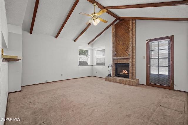 4513 Gen Maloney Cir, El Paso, TX 79924 - unfurnished living room with a fireplace, a ceiling fan, beamed ceiling, carpet flooring, and high vaulted ceiling