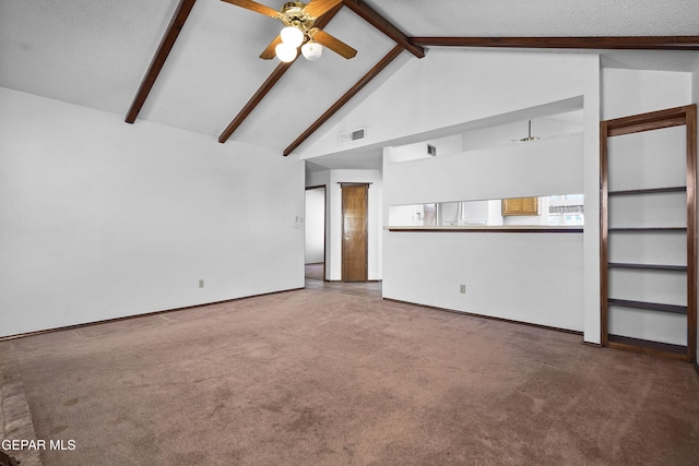 4513 Gen Maloney Cir, El Paso, TX 79924 - unfurnished living room with a ceiling fan, carpet, beam ceiling, high vaulted ceiling, and baseboards