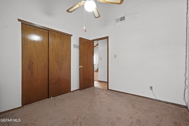 4513 Gen Maloney Cir, El Paso, TX 79924 - unfurnished bedroom with carpet flooring, a closet, ceiling fan, baseboards, and a high ceiling