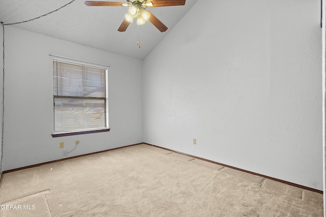 4513 Gen Maloney Cir, El Paso, TX 79924 - unfurnished room featuring light colored carpet, lofted ceiling, a ceiling fan, and baseboards
