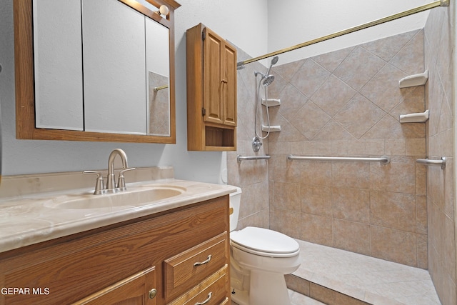 4513 Gen Maloney Cir, El Paso, TX 79924 - bathroom with vanity, toilet, and tiled shower