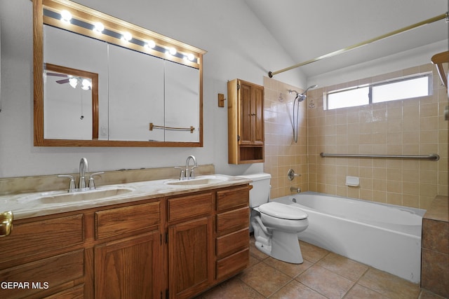 4513 Gen Maloney Cir, El Paso, TX 79924 - full bath featuring double vanity, shower / bathtub combination, tile patterned flooring, vaulted ceiling, and toilet