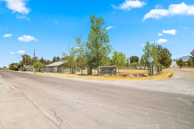 5300 Crawford Rd, Santa Teresa, NM 88008 - view of asphalt street featuring traffic signs
