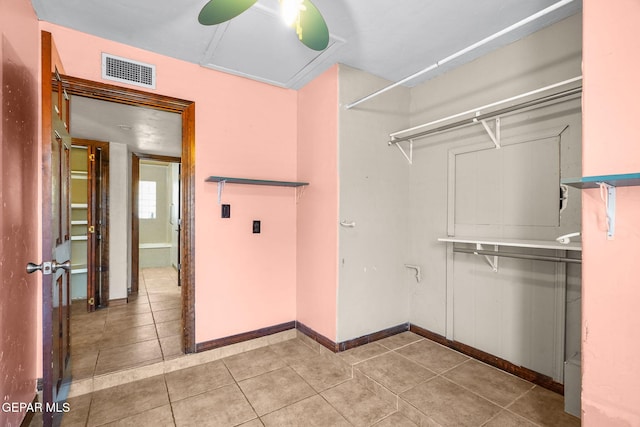 5300 Crawford Rd, Santa Teresa, NM 88008 - walk in closet with light tile patterned flooring