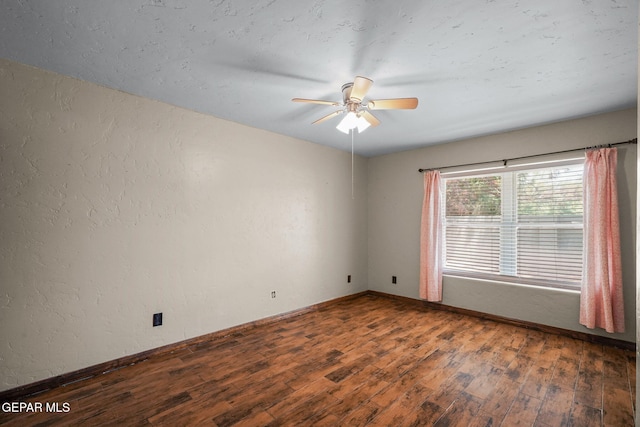5300 Crawford Rd, Santa Teresa, NM 88008 - unfurnished room featuring wood finished floors, ceiling fan, baseboards, and a textured wall
