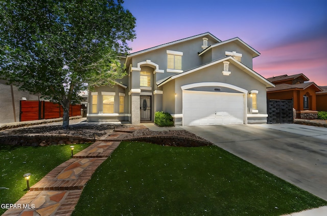 14045 Tower Point Way, El Paso, TX 79938 - view of front facade featuring driveway, stucco siding, and an attached garage