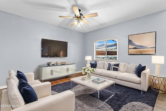 14045 Tower Point Way, El Paso, TX 79938 - living room with wood finished floors, ceiling fan, and baseboards