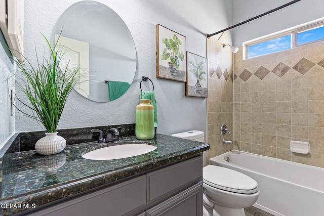 14045 Tower Point Way, El Paso, TX 79938 - full bath featuring toilet, vanity, bathtub / shower combination, and a textured wall