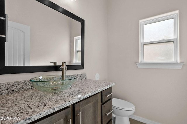 3952 Aspiration St, El Paso, TX 79938 - half bath with vanity, toilet, and baseboards