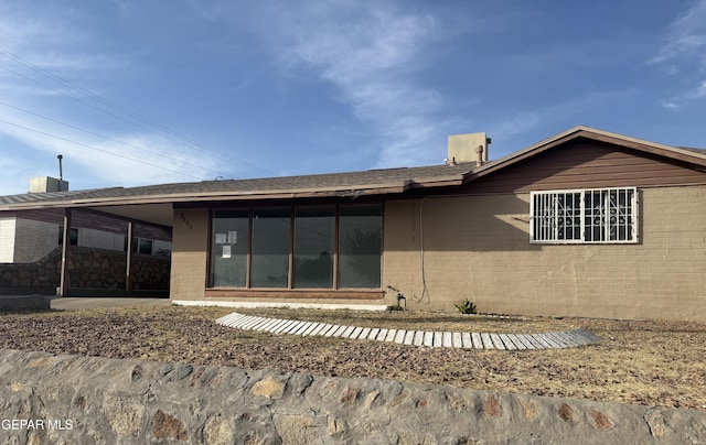 5609 Venezuela Rd, El Paso, TX 79903 - rear view of house with brick siding
