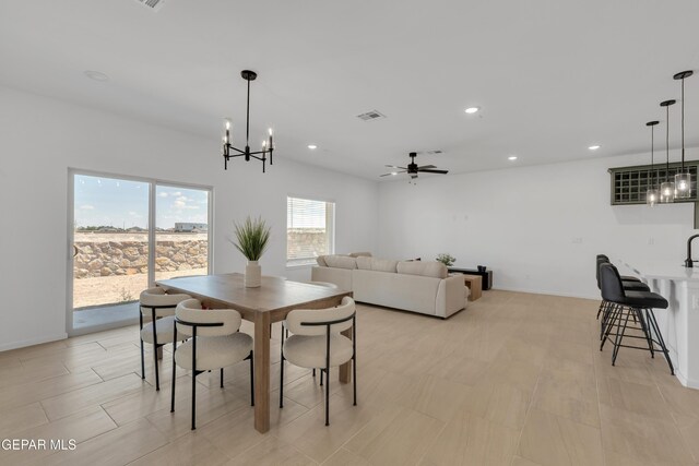 13873 Madero Ave, Horizon City, TX 79928 - dining room featuring a chandelier, recessed lighting, and ceiling fan