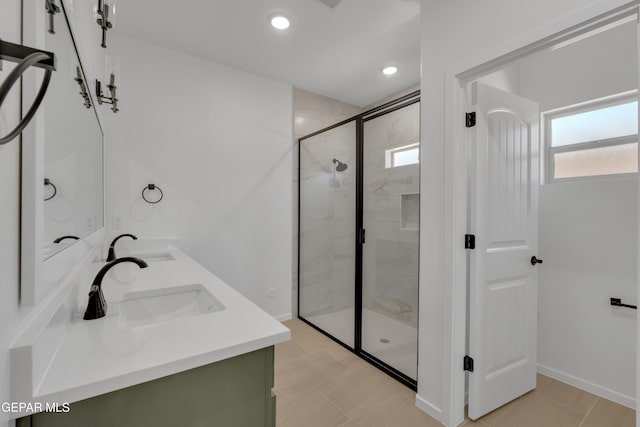 13873 Madero Ave, Horizon City, TX 79928 - bathroom with double vanity, a stall shower, and recessed lighting