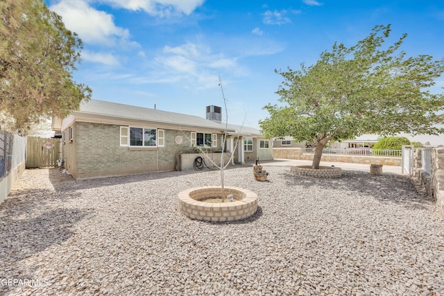 9549 Albany Dr, El Paso, TX 79924 - rear view of house with a fenced backyard, brick siding, and a patio area