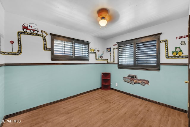 9549 Albany Dr, El Paso, TX 79924 - unfurnished room featuring wood finished floors and baseboards