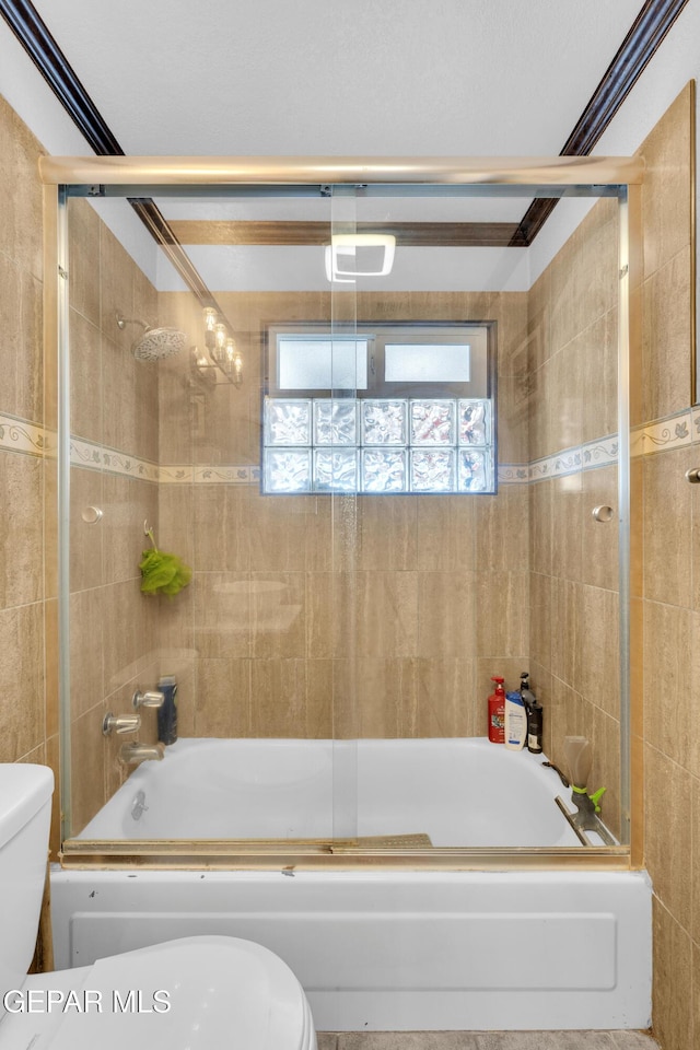 9549 Albany Dr, El Paso, TX 79924 - bathroom featuring toilet, plenty of natural light, and shower / bath combination with glass door
