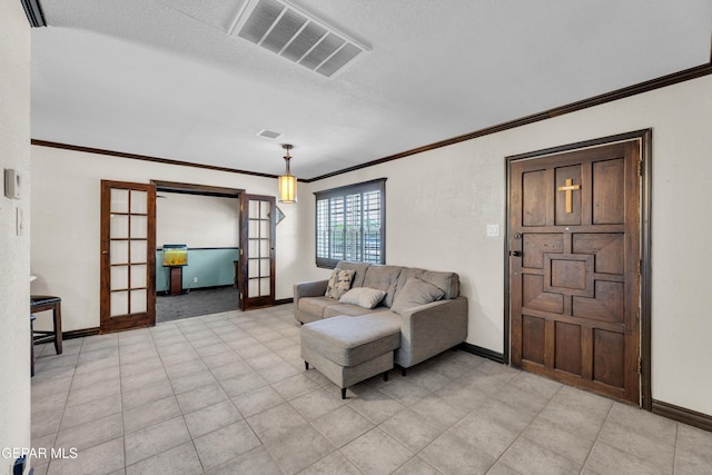 9549 Albany Dr, El Paso, TX 79924 - living area featuring baseboards, ornamental molding, french doors, and a textured ceiling