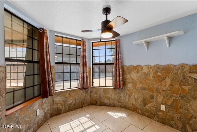 16006 Darley Dr, Horizon City, TX 79928 - unfurnished room with a ceiling fan and tile patterned floors