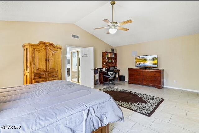 16006 Darley Dr, Horizon City, TX 79928 - bedroom featuring vaulted ceiling, an office area, baseboards, and a ceiling fan
