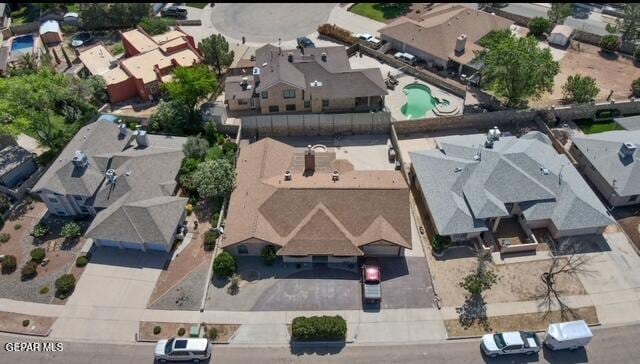 16006 Darley Dr, Horizon City, TX 79928 - aerial view of property and surrounding area with nearby suburban area and a pool area