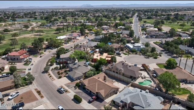 16006 Darley Dr, Horizon City, TX 79928 - aerial view of residential area with a mountainous background