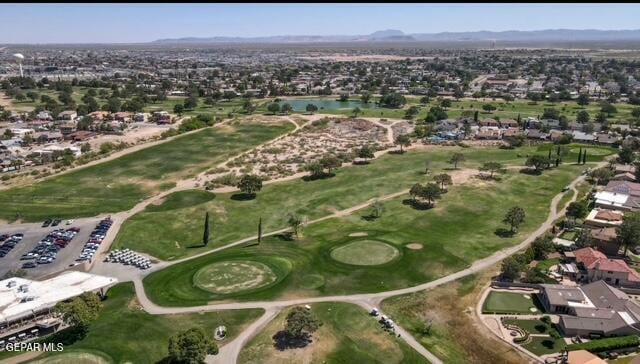 16006 Darley Dr, Horizon City, TX 79928 - aerial view of property and surrounding area with nearby suburban area, a local golf course, and a large body of water