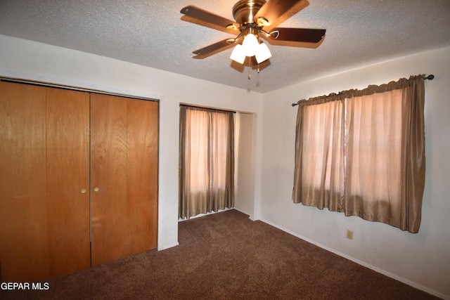 3608 Douglas Ave, El Paso, TX 79903 - unfurnished bedroom featuring carpet, a textured ceiling, and a ceiling fan