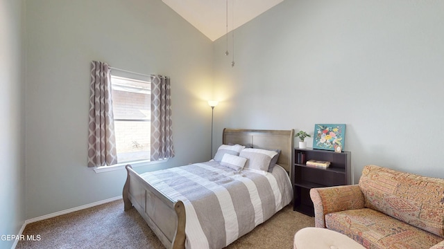 684 Abington Dr, El Paso, TX 79912 - bedroom featuring carpet, baseboards, and high vaulted ceiling